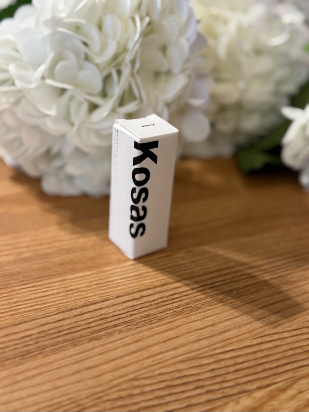 Kosas White Packaging with Black Logo Weightless lip color Darkroom Beauty